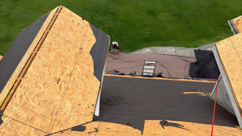 Missouri homeowner learning about lifetime roof warranty coverage and roofing protection