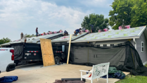 Roofing project Missouri crew installing shingles on a home in Washington MO
