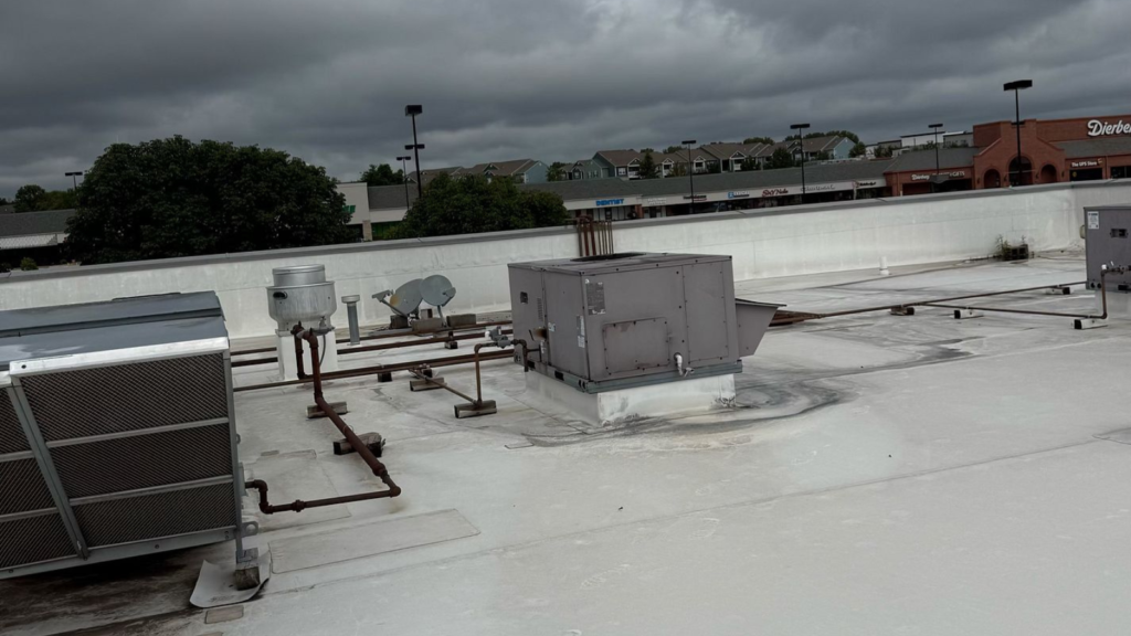 commercial roof Missouri flat roof inspection by RC Roofing technician